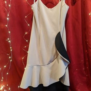 Baby pink dress with black ruffle detail